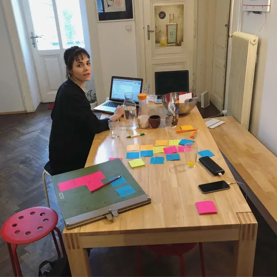 A table covered in sticky notes during planning